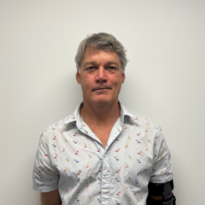 Dr Michael Gibberd smiles at the camera
